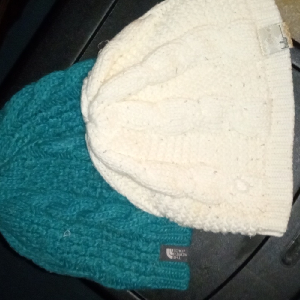 2 North Face knitted hats.